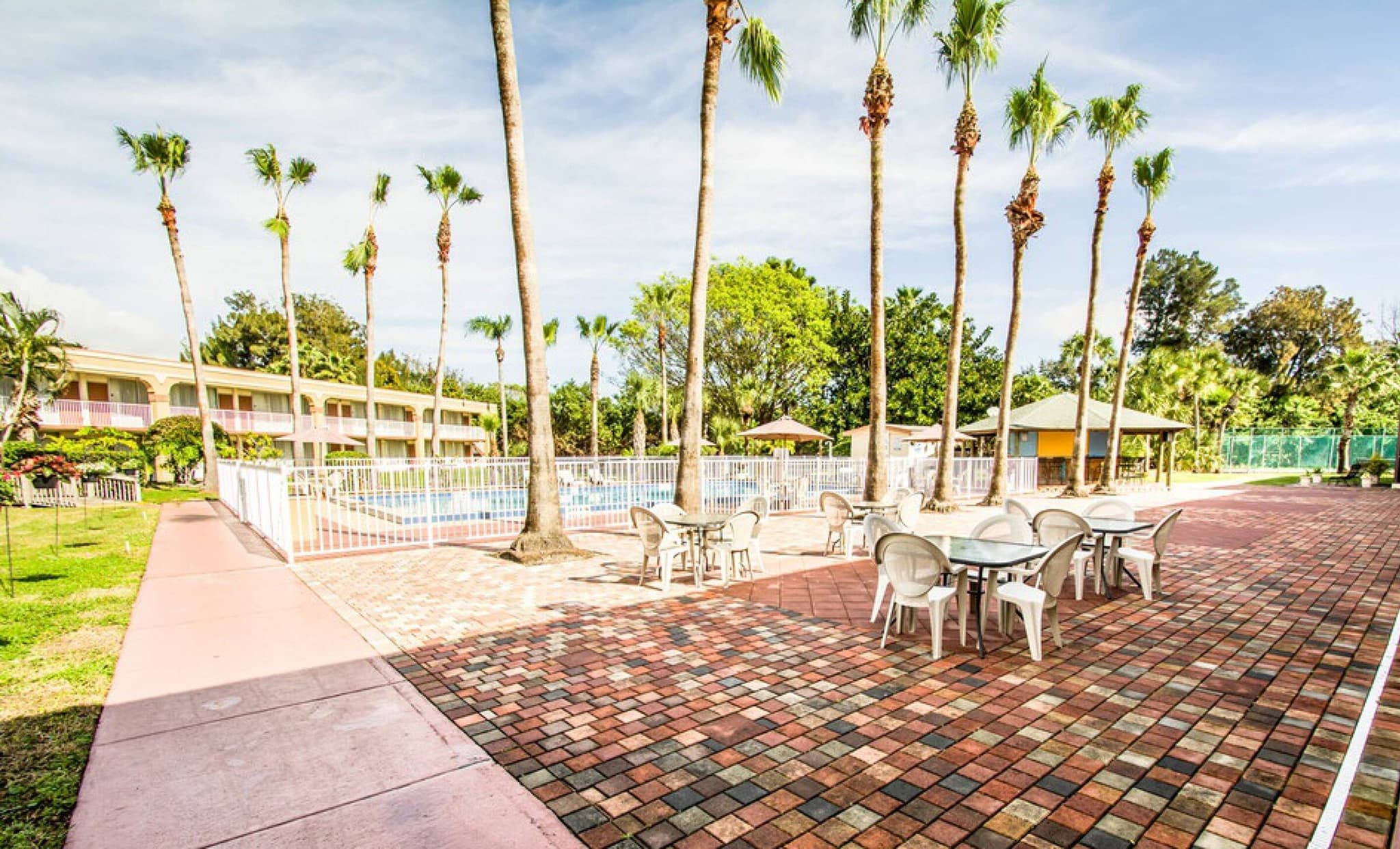 The existing hotel pool courtyard at The Jade Space Coast site on Merritt Island