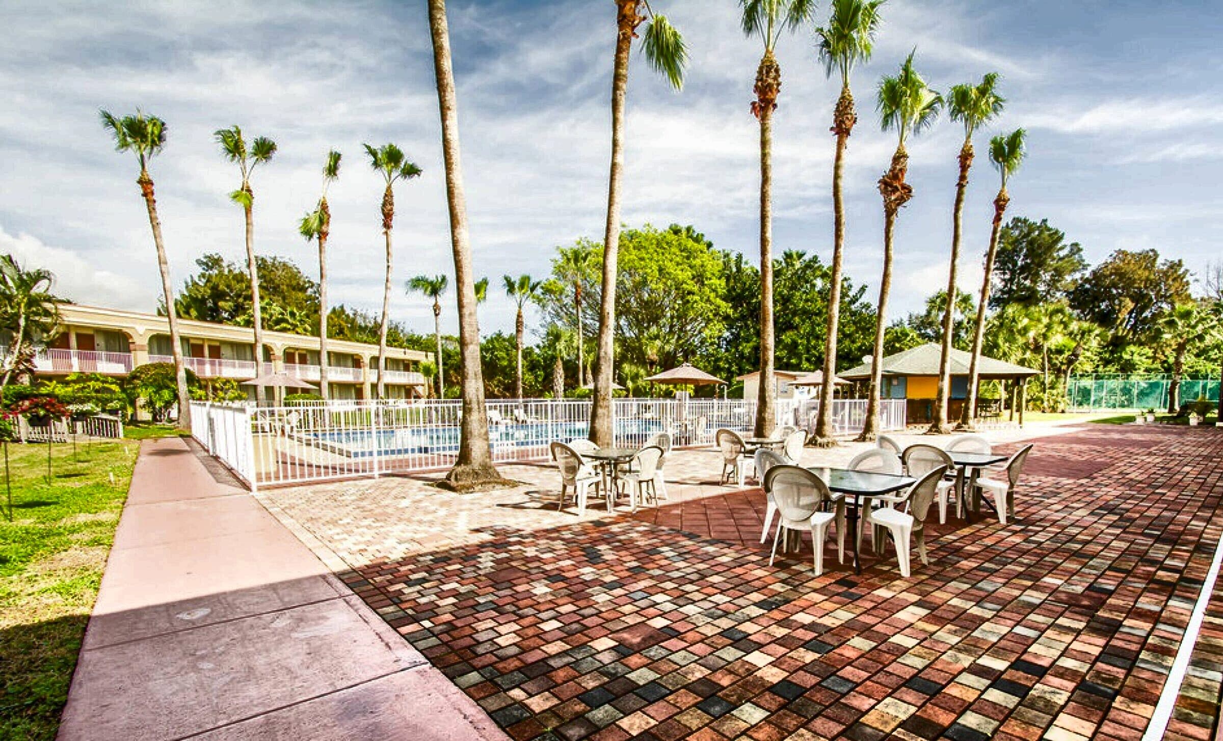 The existing hotel pool courtyard at The Jade Space Coast site on Merritt Island